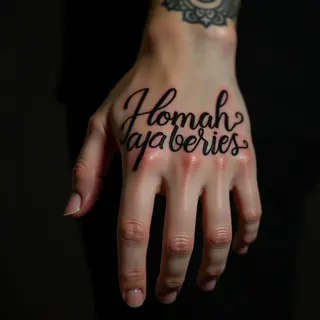 Inspiring Biomechanical Lettering Tattoos for Your Finger