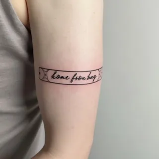 The Enduring Allure of a Black Band Tattoo: Meaning & Inspiration