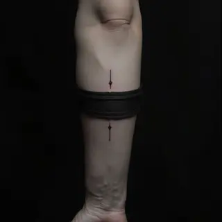 Black Band on Forearm Tattoo: Meaning & Design Inspiration