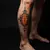 Small Dark Oriental Leg Tattoos: Fiery Inspiration