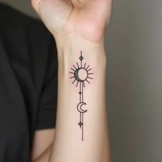 Minimalist Sun and Moon Tattoo on Wrist
