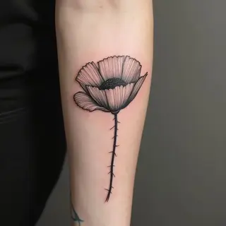 Delicate Poppy Tattoo: A Symbol of Remembrance and Renewal