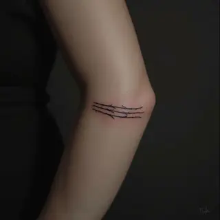 Forearm Two Lines Tattoo: A Woman's Symbolic Journey