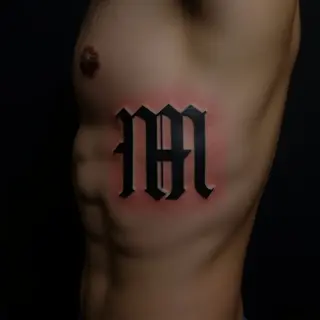 Geometric Lettering Ribcage Tattoos for Men - Small & Stylish