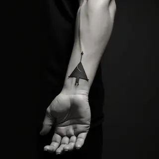 Minimalist Geometric Wrist Tattoos: Cool & Subtle Designs