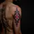 Subtle Back Geometric Tattoos in Blackwork & Red Accents