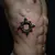 Subtle Rib Cage Ring Tattoos for Men: Geometric Traditional Designs