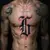 Tiny Gothic Letter Tattoos for Men: Sternum Inspiration