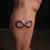 Neo-Traditional Infinity Tattoo with Names for Legs: A Timeless Bond