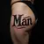 Old School Man's Name Tattoo on Thigh: A Bold Statement