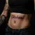 Name Tattoos on Your Stomach: Meaning & Design Ideas