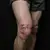 Hand Lettering Tattoos for Men: Stylish Knee Designs