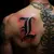 Bold Back Letter Tattoos for Men: Black, Red & Gold Designs