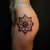 Mandala Lettering Tattoo on Thigh - A Vibrant Design