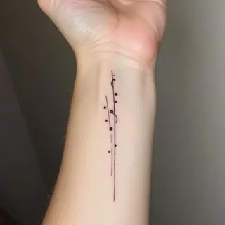 Minimalist Vertical Line Tattoo: A Study in Simplicity
