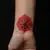 Delicate Red Neo-Traditional Finger Tattoos for Women's Arms