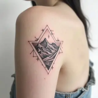 Minimalist Mountain Landscape Tattoo: A Study in Geometry and Nature
