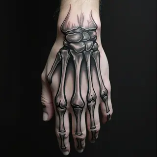 Detailed Skeletal Hand Tattoo on Male Hand