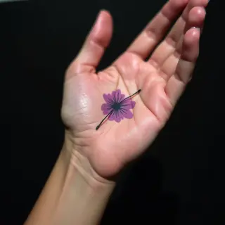 Delicate Watercolor Hand Tattoos for Girls: Meaningful Purple Designs