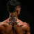 Gothic Polynesian Neck Tattoos: Exploring Tribal Designs & Meanings