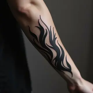 Dynamic Tribal Swirl Tattoo on Forearm
