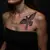 Delicate Women's Chest Tattoos: Meaningful Designs with a Neon Edge