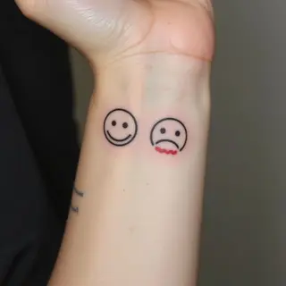 Minimalist Emoticon Tattoo: A Subtle Expression of Emotion